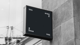 Black cubic signage displaying 