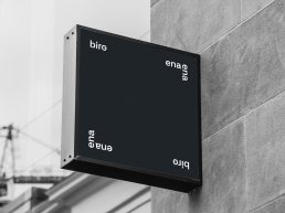 Black cubic signage displaying 