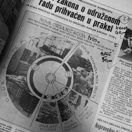 Black and white newspaper page featuring circular organizational diagram with numbered sections and building photographs, dat